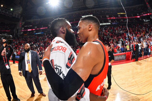 HOUSTON, TX - MARCH 26:  James Harden #13 of the Houston Rockets greets Russell Westbrook #0 of the Oklahoma City Thunder on March 26, 2017 at the Toyota Center in Houston, Texas. NOTE TO USER: User expressly acknowledges and agrees that, by downloading and/or using this photograph, user is consenting to the terms and conditions of the Getty Images License Agreement. Mandatory Copyright Notice: Copyright 2017 NBAE (Photo by Jesse D. Garrabrant/NBAE via Getty Images)