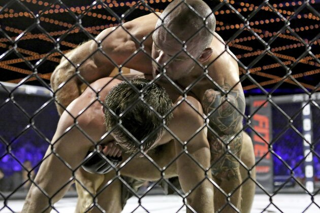 Vagab Vagobov works from the bottom against Bruno Santos during their middleweight WSOF fight at the Theater at Madison Square Garden in New York on Saturday, December 31, 2016. (AP Photo/Gregory Payan)