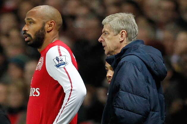 Arsenal's French player Thierry Henry (L) stands next to manager Arsene Wenger as he prepares to substitute for a team-mate during the third round FA Cup football match between Arsenal and Leeds United at The Emirates Stadium in London, on January 9, 2012. AFP PHOTO/IAN KINGTON

RESTRICTED TO EDITORIAL USE. No use with unauthorised audio, video, data, fixture lists, club/league logos or 'live' services. Online in-match use limited to 45 images, no video emulation. No use in betting, games or single club/league/player publications. (Photo credit should read IAN KINGTON/AFP/Getty Images)