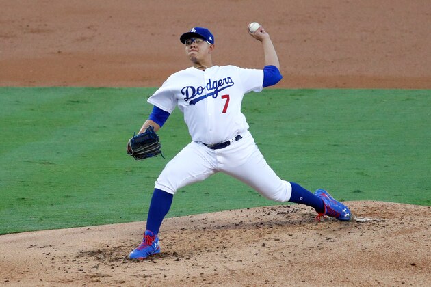 LOS ANGELES, CA - OCTOBER 19:  Julio Urias #7 of the Los Angeles Dodgers pitches in the second inning against the Chicago Cubs in game four of the National League Championship Series at Dodger Stadium on October 19, 2016 in Los Angeles, California.  (Photo by Josh Lefkowitz/Getty Images)