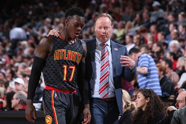 PORTLAND, OR - FEBRUARY 13: Mike Budenholzer of the Atlanta Hawks talks with Dennis Schroder #17 of the Atlanta Hawks during the game against the Portland Trail Blazers on FEBRUARY 13, 2017 at the Moda Center in Portland, Oregon. NOTE TO USER: User expressly acknowledges and agrees that, by downloading and or using this Photograph, user is consenting to the terms and conditions of the Getty Images License Agreement. Mandatory Copyright Notice: Copyright 2017 NBAE (Photo by Sam Forencich/NBAE via Getty Images)