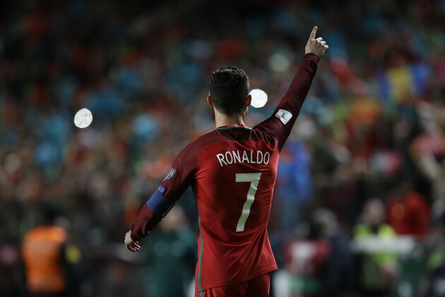 Portugal's Cristiano Ronaldo celebrates after scoring a goal during the World Cup Group B qualifying soccer match between Portugal and Hungary at the Luz stadium in Lisbon Saturday, March 25 2017. (AP Photo/Armando Franca)