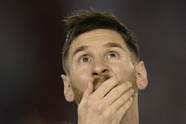 Argentina's forward Lionel Messi gestures during a 2018 FIFA World Cup Russia South American qualifier football match against Chile at the Monumental stadium in Buenos Aires, on March 23, 2017. Argentina won 1-0. / AFP PHOTO / JUAN MABROMATA        (Photo credit should read JUAN MABROMATA/AFP/Getty Images)