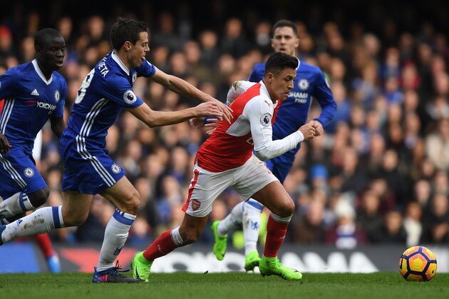 LONDON, ENGLAND - FEBRUARY 04: Alexis Sanchez of Arsenal is challenged by Cesar Azpilicueta of Chelsea during the Premier League match between Chelsea and Arsenal at Stamford Bridge on February 4, 2017 in London, England. (Photo by Mike Hewitt/Getty Images) LONDON, ENGLAND - FEBRUARY 04: Alexis Sanchez of Arsenal is challenged by Cesar Azpilicueta of Chelsea during the Premier League match between Chelsea and Arsenal at Stamford Bridge on February 4, 2017 in London, England. (Photo by Mike Hewitt/Getty Images)
