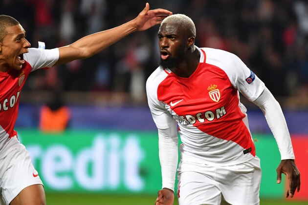 Monaco's French midfielder Tiemoue Bakayoko celebrates with Monaco's French forward Kylian Mbappe Lottin (back) after scoring a goal during the UEFA Champions League round of 16 football match between Monaco and Manchester City at the Stade Louis II in Monaco on March 15, 2017. / AFP PHOTO / PASCAL GUYOT        (Photo credit should read PASCAL GUYOT/AFP/Getty Images)
