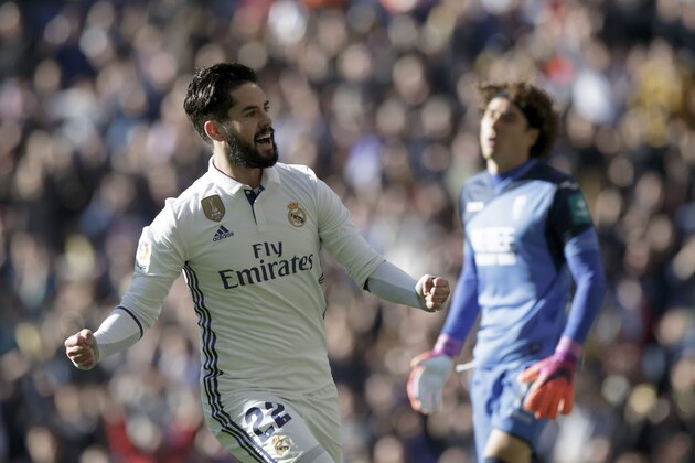 MADRID, SPAIN - JANUARY 07:  Francisco Roman Alarcon alias Isco of Real Madrid CF celebrates scoring their opening goal during the La Liga match between Real Madrid CF and Granada CF at Estadio Santiago Bernabeu on January 7, 2017 in Madrid, Spain.  (Photo by Gonzalo Arroyo Moreno/Getty Images)