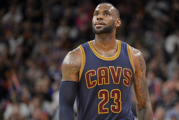 Cleveland Cavaliers forward LeBron James walks upcourt during the second half of an NBA basketball game against the San Antonio Spurs, Monday, March 27, 2017, in San Antonio. San Antonio won 103-74. (AP Photo/Darren Abate)