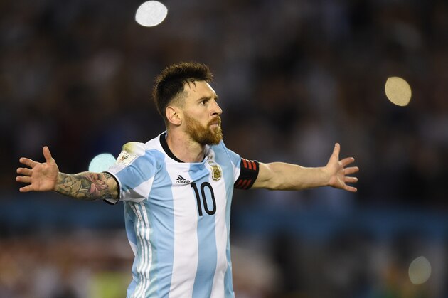 Argentina's Lionel Messi celebrates after scoring against Chile during their 2018 FIFA World Cup qualifier football match at the Monumental stadium in Buenos Aires, Argentina, on March 23, 2017. / AFP PHOTO / EITAN ABRAMOVICH (Photo credit should read EITAN ABRAMOVICH/AFP/Getty Images) Argentina's Lionel Messi celebrates after scoring against Chile during their 2018 FIFA World Cup qualifier football match at the Monumental stadium in Buenos Aires, Argentina, on March 23, 2017. / AFP PHOTO / EITAN ABRAMOVICH (Photo credit should read EITAN ABRAMOVICH/AFP/Getty Images)