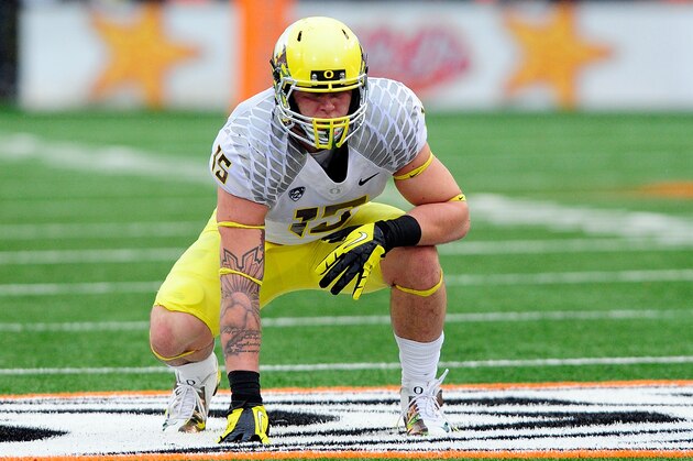 CORVALLIS, OR - NOVEMBER 24: Tight end Colt Lyerla #15 of the Oregon Ducks gets set at the line of scrimmage in the fourth quarter of the game against the Oregon State Beavers on November 24, 2012 at Reser Stadium in Corvallis, Oregon. Oregon won the game 48-24. (Photo by Steve Dykes/Getty Images)