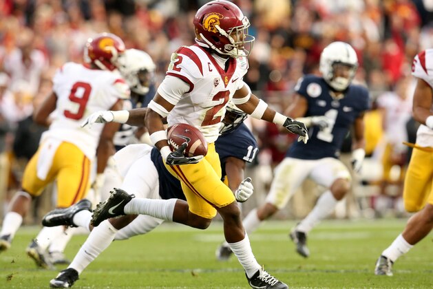 PASADENA, CA - JANUARY 02:  Defensive back Adoree' Jackson #2 of the USC Trojans runs with the ball in the first half as linebacker Brandon Bell #11 of the Penn State Nittany Lions attempts to tackle him during the 2017 Rose Bowl Game presented by Northwestern Mutual at the Rose Bowl on January 2, 2017 in Pasadena, California.  (Photo by Stephen Dunn/Getty Images)