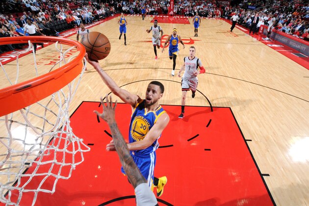 HOUSTON, TX - MARCH 28: Stephen Curry #30 of the Golden State Warriors shoots a lay up during the game against the Houston Rockets on March 28, 2017 at the Toyota Center in Houston, Texas. NOTE TO USER: User expressly acknowledges and agrees that, by downloading and or using this photograph, User is consenting to the terms and conditions of the Getty Images License Agreement. Mandatory Copyright Notice: Copyright 2017 NBAE (Photo by Bill Baptist/NBAE via Getty Images)