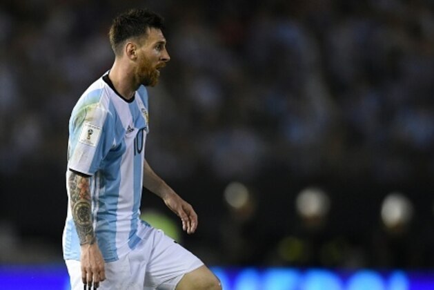 Argentina's Lionel Messi during their 2018 FIFA World Cup qualifier football match against Chile at the Monumental stadium in Buenos Aires, Argentina, on March 23, 2017. / AFP PHOTO / EITAN ABRAMOVICH        (Photo credit should read EITAN ABRAMOVICH/AFP/Getty Images)
