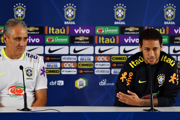 Brazil's footballer Neymar (R) speaks next to team coach Tite (L) during a press conference after a training session on the eve of their 2018 FIFA Russia World Cup qualifier football match against Paraguay, at the Arena Corinthians stadium in Sao Paulo, Brazil on March 27, 2017. / AFP PHOTO / NELSON ALMEIDA (Photo credit should read NELSON ALMEIDA/AFP/Getty Images) Brazil's footballer Neymar (R) speaks next to team coach Tite (L) during a press conference after a training session on the eve of their 2018 FIFA Russia World Cup qualifier football match against Paraguay, at the Arena Corinthians stadium in Sao Paulo, Brazil on March 27, 2017. / AFP PHOTO / NELSON ALMEIDA (Photo credit should read NELSON ALMEIDA/AFP/Getty Images)