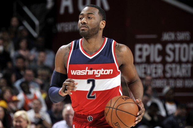 CLEVELAND, OH - MARCH 25: John Wall #2 of the Washington Wizards brings the ball up court during the game against the Cleveland Cavaliers on March 25, 2017 at Quicken Loans Arena in Cleveland, Ohio. NOTE TO USER: User expressly acknowledges and agrees that, by downloading and or using this Photograph, user is consenting to the terms and conditions of the Getty Images License Agreement. Mandatory Copyright Notice: Copyright 2017 NBAE (Photo by David Liam Kyle/NBAE via Getty Images) CLEVELAND, OH - MARCH 25: John Wall #2 of the Washington Wizards brings the ball up court during the game against the Cleveland Cavaliers on March 25, 2017 at Quicken Loans Arena in Cleveland, Ohio. NOTE TO USER: User expressly acknowledges and agrees that, by downloading and or using this Photograph, user is consenting to the terms and conditions of the Getty Images License Agreement. Mandatory Copyright Notice: Copyright 2017 NBAE (Photo by David Liam Kyle/NBAE via Getty Images)