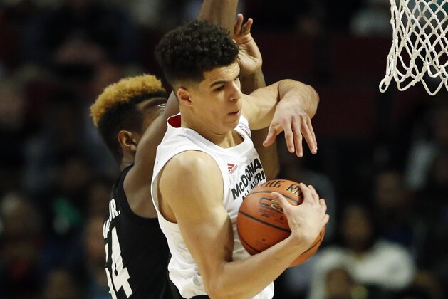 Big West's Michael Porter Jr., right, rebounds a ball against Big East's Wendell Carter Jr., during the first half of the McDonald's All- American boys high school basketball game in Chicago, Wednesday, March 29, 2017. (AP Photo/Nam Y. Huh)