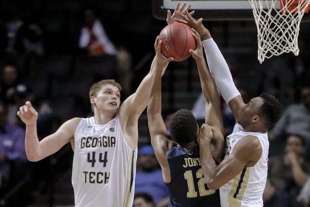 Georgia Tech center Ben Lammers (44) and guard Josh Okogie (5) block a shot attempt by Pittsburgh guard Chris Jones (12) during the second half of an NCAA college basketball game in the first round of the ACC tournament, Tuesday, March 7, 2017, in New York. Pittsburgh won 61-59. (AP Photo/Julie Jacobson) Georgia Tech center Ben Lammers (44) and guard Josh Okogie (5) block a shot attempt by Pittsburgh guard Chris Jones (12) during the second half of an NCAA college basketball game in the first round of the ACC tournament, Tuesday, March 7, 2017, in New York. Pittsburgh won 61-59. (AP Photo/Julie Jacobson)