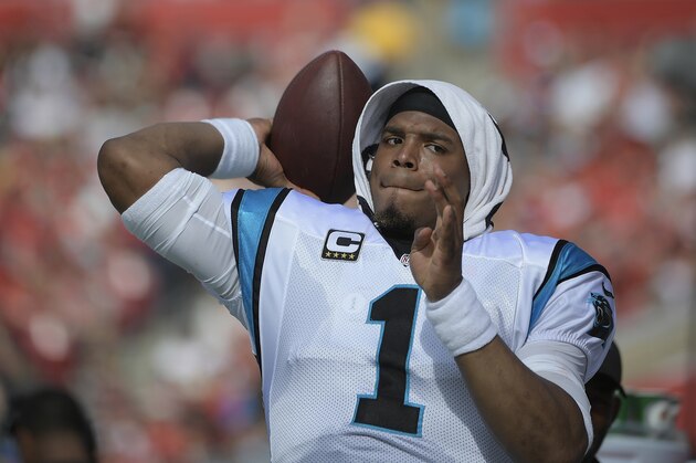 Carolina Panthers quarterback Cam Newton (1) warms up against the Tampa Bay Buccaneers during the second quarter of an NFL football game Sunday, Jan. 1, 2017, in Tampa, Fla. (AP Photo/Phelan Ebenhack)