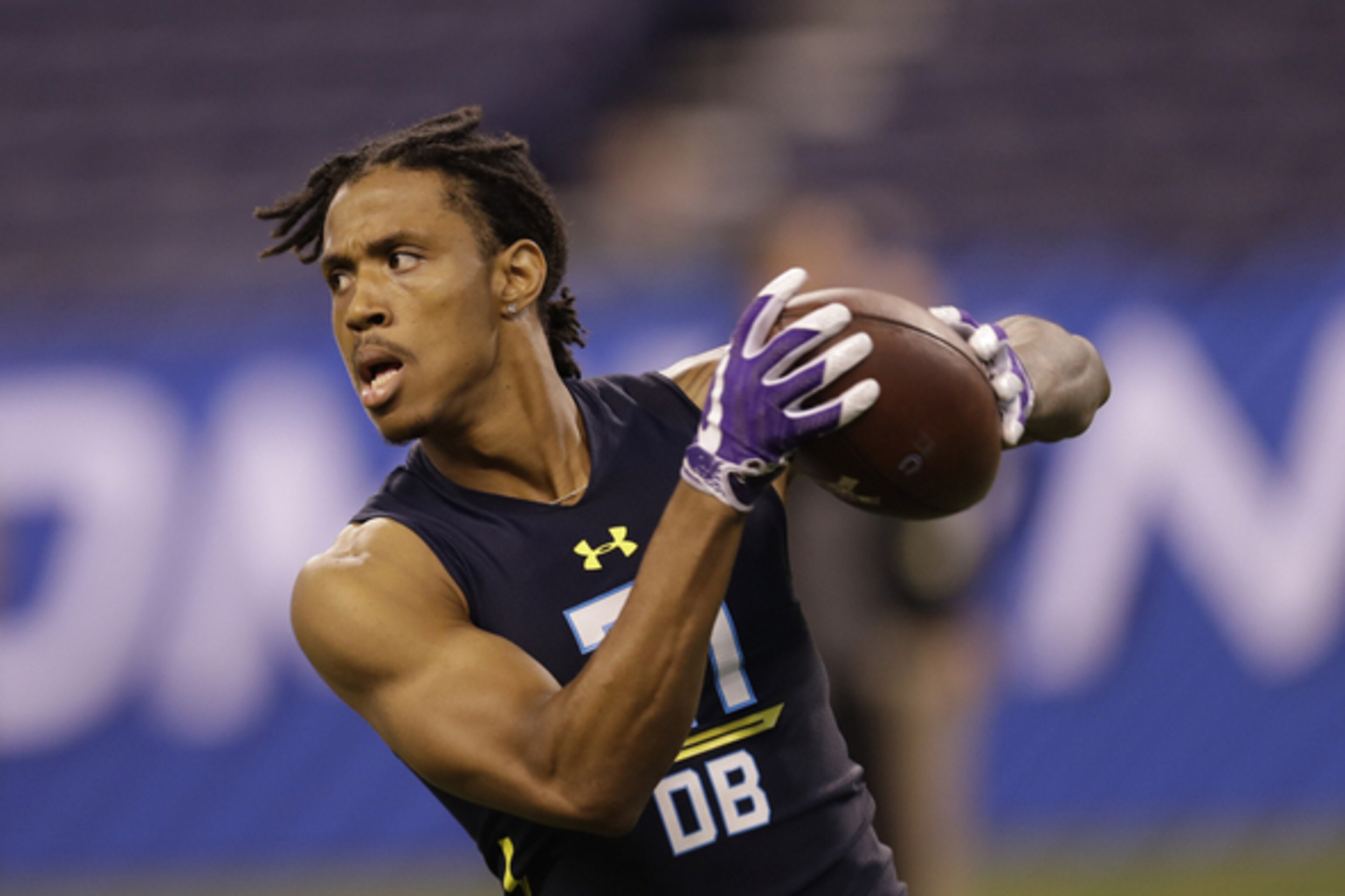 Washington defensive back Kevin King runs a drill at the NFL football scouting combine Monday, March 6, 2017, in Indianapolis. (AP Photo/David J. Phillip)