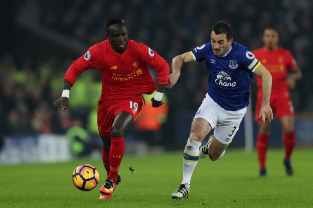 LIVERPOOL, ENGLAND - DECEMBER 19: Leighton Baines of Everton in action with Sadio Mane of Liverpool during the Premier League match between Everton and Liverpool at Goodison Park on December 19, 2016 in Liverpool, England. (Photo by Chris Brunskill Ltd/Getty Images)