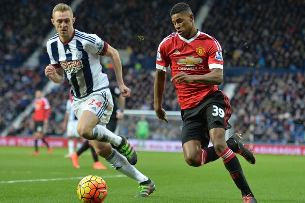 Manchester United's English striker Marcus Rashford (R) vies with West Bromwich Albion's Scottish midfielder Darren Fletcher during the English Premier League football match between West Bromwich Albion and Manchester United at The Hawthorns stadium in West Bromwich, central England, on March 6, 2016.
 / AFP / Paul ELLIS / RESTRICTED TO EDITORIAL USE. No use with unauthorized audio, video, data, fixture lists, club/league logos or 'live' services. Online in-match use limited to 75 images, no video emulation. No use in betting, games or single club/league/player publications.  /         (Photo credit should read PAUL ELLIS/AFP/Getty Images)