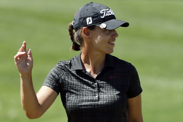Karine Icher of France, waves after a birdie on the 17th hole during the first round of the LPGA Tour ANA Inspiration golf tournament at Mission Hills Country Club Thursday, March 30, 2017 in Rancho Mirage, Calif. (AP Photo/Chris Carlson)