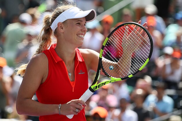 KEY BISCAYNE, FL - MARCH 30:  Caroline Wozniacki of Denmark match point against Karolina Pliskova of the Czech Republic during Day 11 of the Miami Open at Crandon Park Tennis Center on March 30, 2017 in Key Biscayne, Florida.  (Photo by Al Bello/Getty Images)