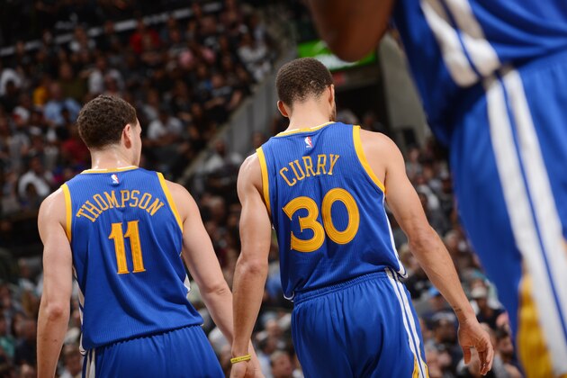 SAN ANTONIO, TX - MARCH 29: Klay Thompson #11 and Stephen Curry #30 of the Golden State Warriors look on during the game against the San Antonio Spurs on March 29, 2017 at AT&T Center in San Antonio, Texas. NOTE TO USER: User expressly acknowledges and agrees that, by downloading and or using this photograph, user is consenting to the terms and conditions of Getty Images License Agreement. Mandatory Copyright Notice: Copyright 2017 NBAE (Photo by Noah Graham/NBAE via Getty Images)