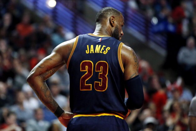 Cleveland Cavaliers forward LeBron James walks back to the bench during the second half of an NBA basketball game against the Chicago Bulls Thursday, March 30, 2017, in Chicago. The Bulls won 99-93. (AP Photo/Nam Y. Huh)