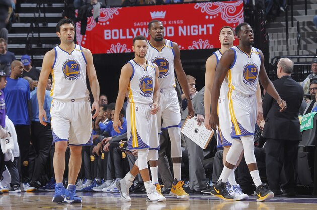 SACRAMENTO, CA - JANUARY 8: Zaza Pachulia #27, Stephen Curry #30, Kevin Durant #35, Klay Thompson #11 and Draymond Green #23 of the Golden State Warriors face off against the Sacramento Kings on January 8, 2017 at Golden 1 Center in Sacramento, California. NOTE TO USER: User expressly acknowledges and agrees that, by downloading and or using this photograph, User is consenting to the terms and conditions of the Getty Images Agreement. Mandatory Copyright Notice: Copyright 2017 NBAE (Photo by Rocky Widner/NBAE via Getty Images)
