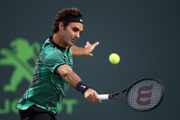 KEY BISCAYNE, FL - MARCH 31:  Roger Federer of Switzerland in action against Nick Kyrgios of Australia in the semi finals at Crandon Park Tennis Center on March 31, 2017 in Key Biscayne, Florida.  (Photo by Julian Finney/Getty Images)