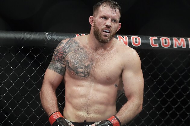 Ryan Bader, of the United States, stands after defeating Rogerio Minotauro, of Brazil, during their UFC light heavyweight mixed martial arts bout in Sao Paulo, Brazil, early Sunday, Nov. 20, 2016. (AP Photo/Andre Penner)