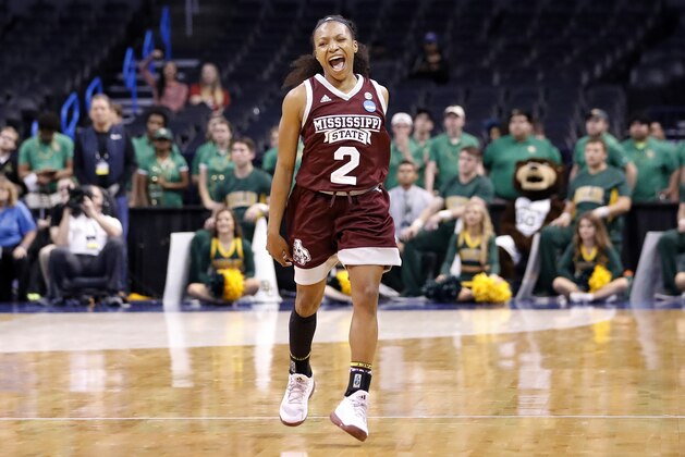 Mississippi State's Morgan William (2) celebrates at the conclusion of the regional final of the NCAA women's college basketball tournament against Baylor, Sunday, March 26, 2017, in Oklahoma City. Mississippi State won 94-85. (AP Photo/Alonzo Adams)