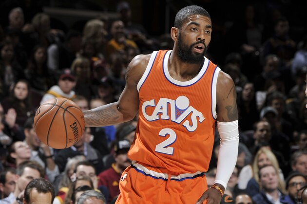 CLEVELAND, OH - MARCH 31: Kyrie Irving #2 of the Cleveland Cavaliers handles the ball against the Philadelphia 76ers during the game on March 31, 2017 at Quicken Loans Arena in Cleveland, Ohio. NOTE TO USER: User expressly acknowledges and agrees that, by downloading and/or using this Photograph, user is consenting to the terms and conditions of the Getty Images License Agreement. Mandatory Copyright Notice: Copyright 2017 NBAE  (Photo by David Liam Kyle/NBAE via Getty Images)