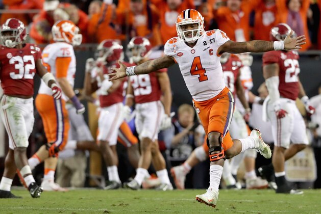 TAMPA, FL - JANUARY 09:  Deshaun Watson #4 of the Clemson Tigers celebrates after throwing a 2-yard game-winning touchdown pass during the fourth quarter against the Alabama Crimson Tide to win the 2017 College Football Playoff National Championship Game 35-31 at Raymond James Stadium on January 9, 2017 in Tampa, Florida.  (Photo by Streeter Lecka/Getty Images)