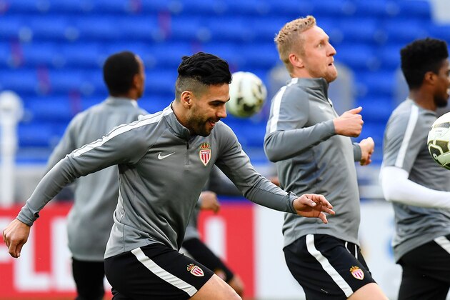 (L-R)) Monaco's Colombian forward Radamel Falcao, Polish defender Kamil Glik and Brazilian defender Jemerson participate in a training session at the Parc Olympique Lyonnais stadium in Decines-Charpieu, near Lyon, on March 31,  2017, on the eve of the French League Cup football match final Monaco (ASM) versus Paris Saint-Germain (PSG).  / AFP PHOTO / FRANCK FIFE        (Photo credit should read FRANCK FIFE/AFP/Getty Images)