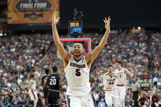 Gonzaga's Nigel Williams-Goss (5) celebrates after the semifinals of the Final Four NCAA college basketball tournament against South Carolina, Saturday, April 1, 2017, in Glendale, Ariz. Gonzaga won 77-73. (AP Photo/Charlie Neibergall)