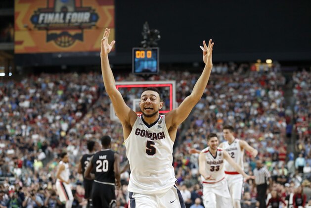Gonzaga's Nigel Williams-Goss (5) celebrates after the semifinals of the Final Four NCAA college basketball tournament against South Carolina, Saturday, April 1, 2017, in Glendale, Ariz. Gonzaga won 77-73. (AP Photo/Charlie Neibergall)
