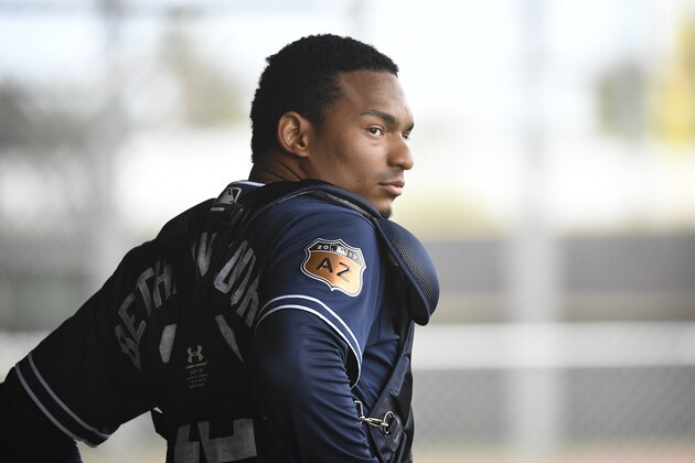 PEORIA,AZ - FEBRUARY 18: Christian Bethancourt #12 of the San Diego Padres participates in a spring training workout at the Peoria Sports Complex on February 18, 2017 in Peoria, Arizona. (Photo by Andy Hayt/San Diego Padres/Getty Images)