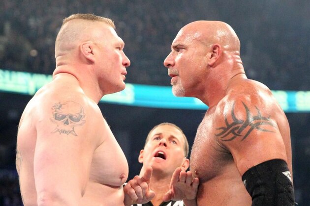 Brock Lesnar and Goldberg having a staring contest.