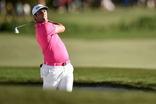 HUMBLE, TX - MARCH 31: John Rahm of Spain hits his second shot on the 18th hole during the second round of the Shell Houston Open at the Golf Club of Houston on March 31, 2017 in Humble, Texas. (Photo by Stacy Revere/Getty Images)