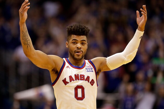 LAWRENCE, KS - FEBRUARY 13:  Frank Mason III #0 of the Kansas Jayhawks pumps up the crowd during the game against the West Virginia Mountaineers at Allen Fieldhouse on February 13, 2017 in Lawrence, Kansas.  (Photo by Jamie Squire/Getty Images)