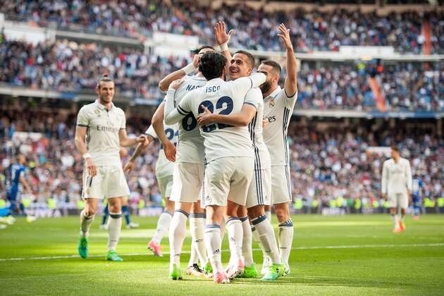 MADRID, SPAIN - APRIL 02:  Nacho of Real Madrid celebrates with Isco Alarcon and Lucas Vazquez after scoring Real's 3rd goal during the La Liga match between Real Madrid CF and Deportivo Alaves on April 2, 2017 in Madrid, Spain.  (Photo by Denis Doyle/Getty Images)
