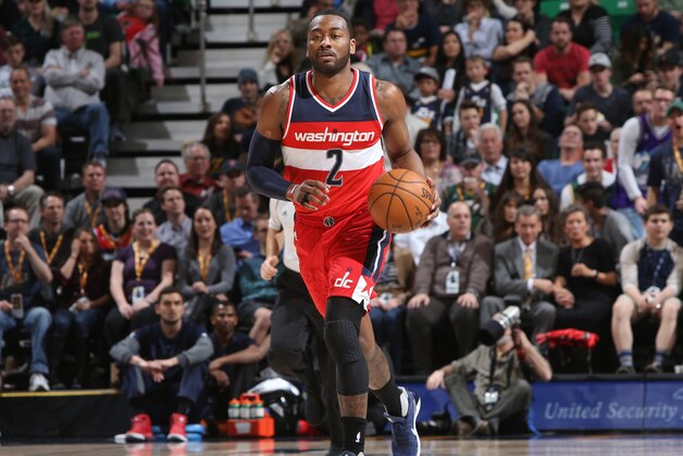 SALT LAKE CITY, UT - MARCH 31: John Wall #2 of the Washington Wizards drives to the basket against the Utah Jazz during the game on March 31, 2017 at vivint.SmartHome Arena in Salt Lake City, Utah. NOTE TO USER: User expressly acknowledges and agrees that, by downloading and or using this Photograph, User is consenting to the terms and conditions of the Getty Images License Agreement. Mandatory Copyright Notice: Copyright 2017 NBAE (Photo by Melissa Majchrzak/NBAE via Getty Images)