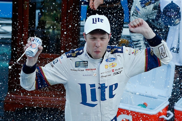 MARTINSVILLE, VA - APRIL 02:  Brad Keselowski, driver of the #2 Miller Lite Ford, celebrates in Victory Lane after winning the Monster Energy NASCAR Cup Series STP 500 at Martinsville Speedway on April 2, 2017 in Martinsville, Virginia.  (Photo by Sean Gardner/Getty Images)