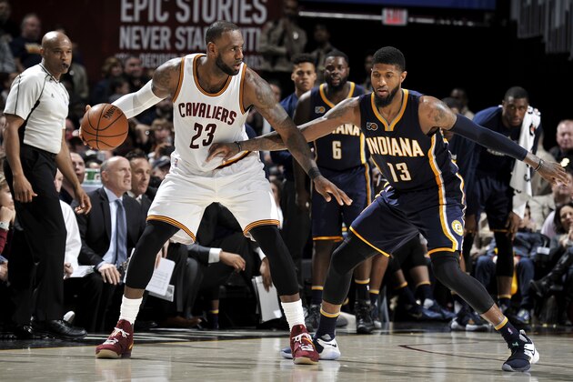 CLEVELAND, OH - APRIL 2: LeBron James #23 of the Cleveland Cavaliers handles the ball during the game against Paul George #13 of the Indiana Pacers on April 2, 2017 at Quicken Loans Arena in Cleveland, Ohio. NOTE TO USER: User expressly acknowledges and agrees that, by downloading and or using this Photograph, user is consenting to the terms and conditions of the Getty Images License Agreement. Mandatory Copyright Notice: Copyright 2017 NBAE (Photo by David Liam Kyle/NBAE via Getty Images) CLEVELAND, OH - APRIL 2: LeBron James #23 of the Cleveland Cavaliers handles the ball during the game against Paul George #13 of the Indiana Pacers on April 2, 2017 at Quicken Loans Arena in Cleveland, Ohio. NOTE TO USER: User expressly acknowledges and agrees that, by downloading and or using this Photograph, user is consenting to the terms and conditions of the Getty Images License Agreement. Mandatory Copyright Notice: Copyright 2017 NBAE (Photo by David Liam Kyle/NBAE via Getty Images)