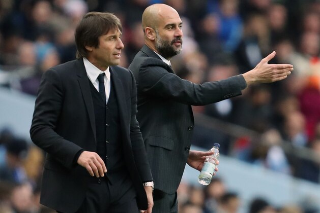 MANCHESTER, ENGLAND - DECEMBER 03: Antonio Conte manager / head coach of Chelsea and Josep Guardiola the head coach / manager of Manchester City during the Premier League match between Manchester City and Chelsea at Etihad Stadium on December 3, 2016 in Manchester, England. (Photo by James Baylis - AMA/Getty Images)