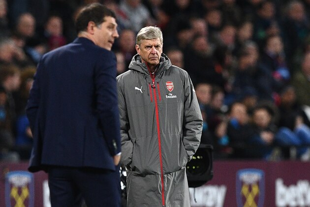 Arsenal's French manager Arsene Wenger (R) and West Ham United's Croatian manager Slaven Bilic watch from the touchline during the English Premier League football match between West Ham United and Arsenal at The London Stadium, in east London on December 3, 2016. / AFP / Justin TALLIS / RESTRICTED TO EDITORIAL USE. No use with unauthorized audio, video, data, fixture lists, club/league logos or 'live' services. Online in-match use limited to 75 images, no video emulation. No use in betting, games or single club/league/player publications.  /         (Photo credit should read JUSTIN TALLIS/AFP/Getty Images)