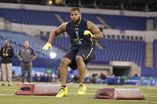 Alabama linebacker Ryan Anderson runs a drill at the NFL football scouting combine in Indianapolis, Sunday, March 5, 2017. (AP Photo/Michael Conroy)