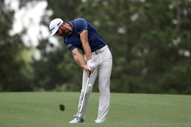 AUGUSTA, GA - APRIL 03:  Dustin Johnson of the United States hits a shot on the 15th hole during a practice round prior to the start of the 2017 Masters Tournament at Augusta National Golf Club on April 3, 2017 in Augusta, Georgia.  (Photo by Rob Carr/Getty Images)