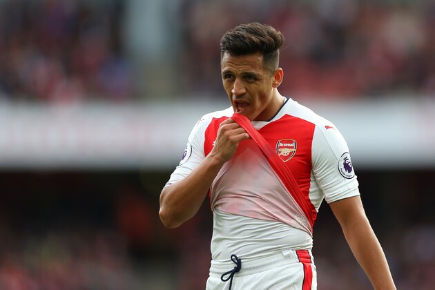 LONDON, ENGLAND - APRIL 02: Alexis Sanchez of Arsenal wipes his face during the Premier League match between Arsenal and Manchester City at Emirates Stadium on April 2, 2017 in London, England. (Photo by Catherine Ivill - AMA/Getty Images)